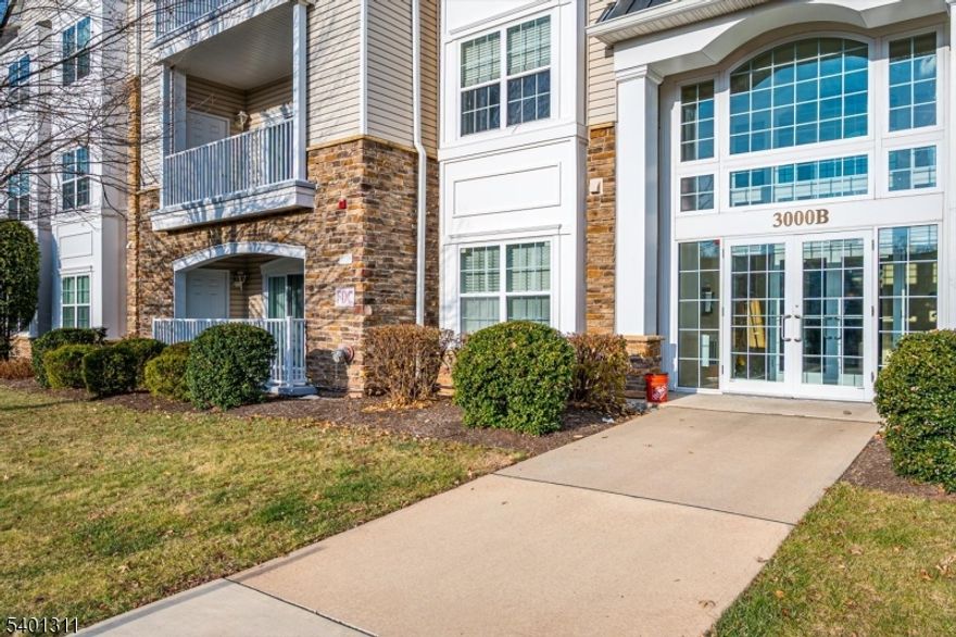 This lovely well-maintained first floor unit is nestled deep in the private community of Somerset Run. The unit boasts tray ceilings, wood floor entry way, large open dining room/living room area and a separate den. There is a new quartz counter top and sink in the eat-in kitchen which also features under cabinet task lighting. Off the kitchen is a spacious laundry room with its own utility tub. In the large primary en-suite is a double sink vanity, linen closet, large walk-in closet and separate water closet. Just off the second bedroom is a second full bathroom that also has its own linen closet. HVAC replaced in 2021! The unit is conveniently close to the elevator; and there are two separate storage rooms - on the balcony and the other just down the hall from the unit (#8). Two assigned parking spots (#36 and #39). The Somerset Run 55+ community has a 25,000 sf clubhouse with indoor and outdoor pools, ballroom, exercise room with locker rooms and sauna, art room, billiards, and plenty of space for cards and mahjong. Join the many clubs and organizations and attend the many activities that the community offers. Minutes to major highways, local restaurants, county golf courses and parks.