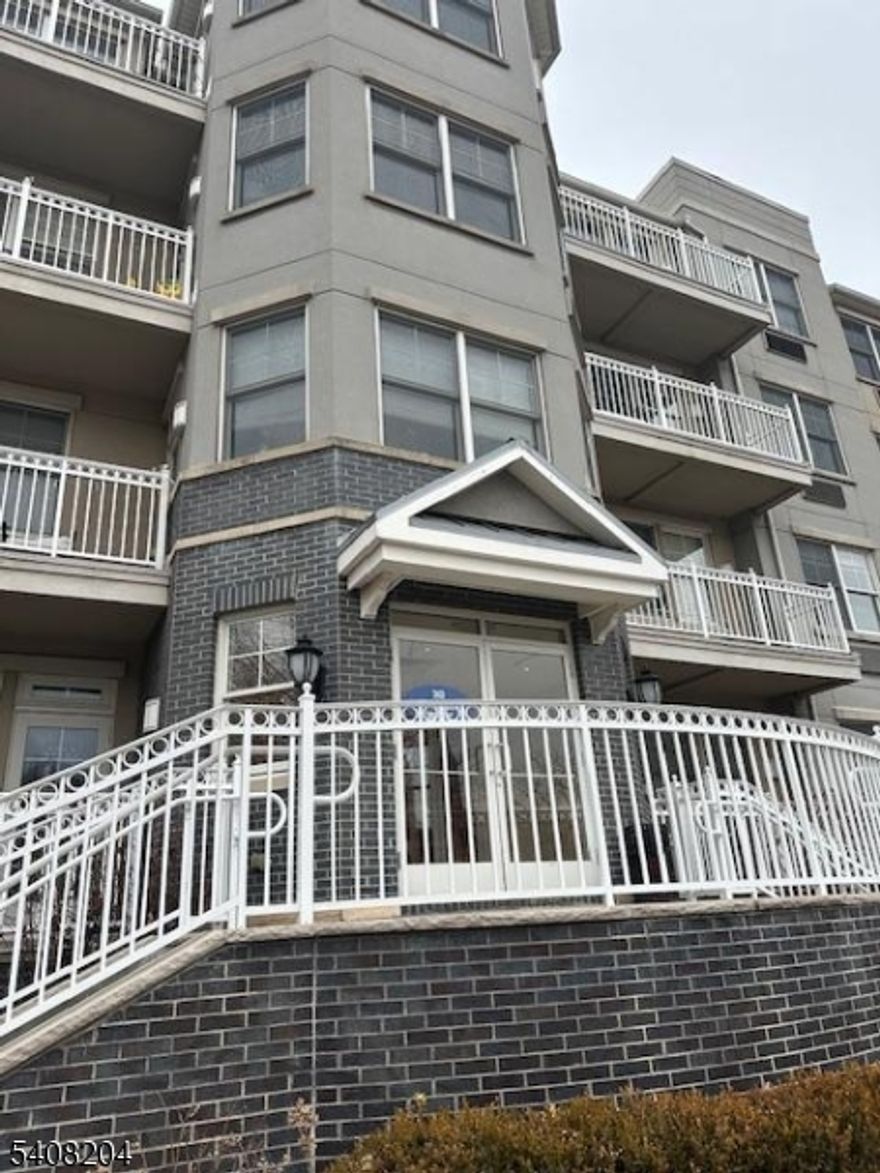 Welcome to Port Liberte, a one-of-a-kind waterfront community offering resort-style living in Jersey City. This beautifully maintained 1-bedroom, 1-bath condo features hardwood floors throughout the living area, new carpet in the bedroom, and recessed lighting for a clean, modern feel. The kitchen is equipped with stainless steel appliances just 3 years young. The spacious bedroom includes a walk-in closet, while the oversized bathroom offers a relaxing soaking tub. Step out onto your private terrace and enjoy breathtaking NYC skyline and Statue of Liberty views. HOA FEE includes water, hot water, parking, plus amenities: two outdoor pools, tennis and basketball courts, fitness center with saunas, dog park, clubhouse, outdoor play area, 24-hour gated security, elevator service, daily trash removal, snow removal, and professional landscaping. You will love the on-site NY Waterway Ferry to Lower Manhattan and the free shuttle to the Grove Street PATH Station. Pack your bags and move right in!!