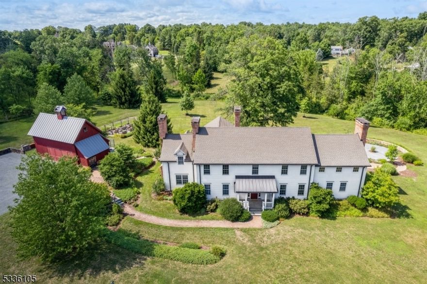 This charming 4 bed updated colonial in the heart of Bedminster is a true gem. The attention to detail throughout the home is exceptional, with hardwood floors and 7 fireplaces adding to the charm. The open kitchen features a fireplace, center island, top of the line appliances, and French doors leading to the back patio. The library boasts built-ins, a fireplace, and French doors to the patio as well. The owner's suite is a luxurious retreat, with a walk-in closet, office space, fireplace, and a stunning bath. The gardens and patio areas, designed by local architect John Charles Smith, are perfect for outdoor entertaining. The home has a great flow, making it ideal for small or large gatherings. A detached garage barn with loft storage and a dog run provide ample space for cars and pets. The fenced-in vegetable garden is a gardener's dream. Radiant heat keeps the home cozy, and it is conveniently located near shopping, transportation, and highways. Don't miss out on this fantastic opportunity to own a beautiful home in a desirable location.