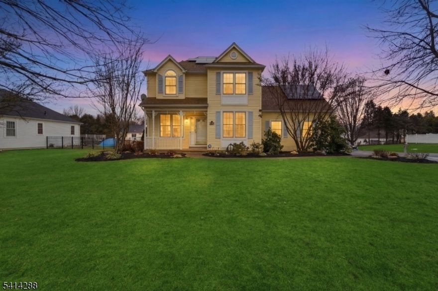 Welcome to this premium lot located in the desirable Country Hills section of Lopatcong Township. This Rosedale model shows true pride of ownership from the moment you enter. The main level features a bright living room, a dining room with a fireplace, and a spacious kitchen with a center island. A sliding door leads to your private backyard retreat complete with a paver patio (2016), covered porch, and above-ground pool perfect for relaxing or entertaining. A convenient half bathroom is also located on the first floor. Upstairs you'll find three bedrooms. The primary suite includes a full bathroom and walk-in closet, while the two additional bedrooms share another full bathroom. The finished basement offers additional living space with a bar area, utility room, and a private office that can easily serve as a fourth bedroom if needed. Major updates include a new roof (2024), Anderson windows (2014), solar panels (2014), water heater (2021), generator (2022), new carpeting (2026), and freshly painted interior.  This property is conveniently located near Lopatcong Middle School and Phillipsburg High School. You're also close to parks, walking trails, farmland, local veterinarians, and everyday shopping. Commuters will love the easy access to Routes 78, 22, and 80, and you're just minutes from Easton Pa I. This home is truly move-in ready with big-ticket items already taken care of.