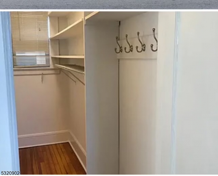 lovely, high ceiling 2 bedroom updated apt. Central air, washer/dryer  and parking with limitations in rear.Please call for more information. Walk to train, across st and shopping!  PERFECT LOCATION!