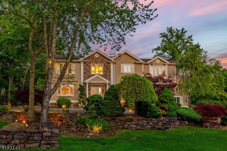 Prepare to be WOWED!  This expansive Colonial provides all the amenities for today's lifestyle.  Perched perfectly in the prestigious Riker Hill neighborhood, this home provides open and airy spaces, soothing colors and seamless indoor/outdoor living.  The inviting foyer separates the Living Room, a perfect entertaining space while the Dining Room offers a bay window and plenty of space to host your next dinner party.  The newly renovated Kitchen features an island with stone counters, a subway tile backsplash and custom cabinetry. A separate breakfast area leads to the vaulted Family Room basked in abundant light and skylights.  French doors from the Family Room and the Kitchen open up to the newly renovated two-tier deck overlooking the beautifully landscaped backyard.  The primary suite showcases a tray ceiling, office/ sitting room, a large walk in closet, and a spa-like bath with a separate shower and jacuzzi tub.  There are 3 additional bedrooms on the 2nd floor; one of which is a second suite featuring a newly re-designed bathroom with a soaking tub and separate shower.  The basement provides additional space for a rec room as well as storage.  Additional features include an oversized garage, central vac, multi-zone sprinkler system, exterior lighting and an outdoor basketball court.  Conveniently located near rt 280, top rated schools, and under an hour from NYC!