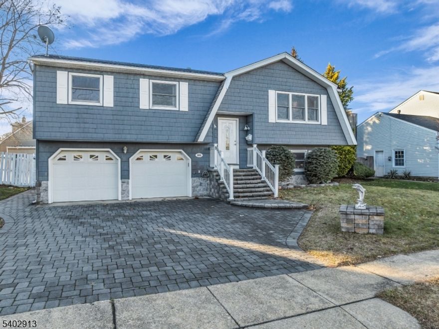 This inviting three bedrooms, two full bathrooms home is perfect for comfortable living. You'll enjoy the charm of hardwood floors throughout and the luxury of a 20 x 40 in-ground pool. The fenced yard provides privacy, while the oversized two-car garage offers ample space for vehicles and storage. Stay cool with central air conditioning and admire the brick paver driveway that enhances the home's curb appeal. In the family room, unwind by the cozy wood-burning fireplace, adding warmth and ambiance to your living space.Nestled on a very private cul-de-sac, this home is conveniently located within walking distance of both the middle school and high school. Additionally, it's just a short distance from Riverfront Park, ocean beaches, the boardwalk, and the vibrant downtown Point Pleasant Beach shopping area.