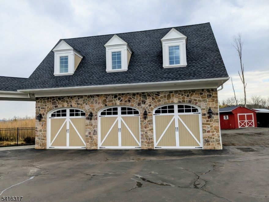 Beautiful apartment in a private estate setting. Situated on 2nd floor, above detached garage. Private entrance in rear of garage leads to open porch that opens to apartment with living room & eat-in kitchen. 2 Bedrooms and full bath. Tiled bathroom features dual vanity & shower. Kitchen includes all appliances, electric range, microwave, dishwasher, refrigerator, stackable washer and dryer. Special features include blinds, recessed lights, ceiling fans & central air. Rent includes heat, hot water, electric, trash removal. Absolutely no pets, no smoking permitted in the apartment.