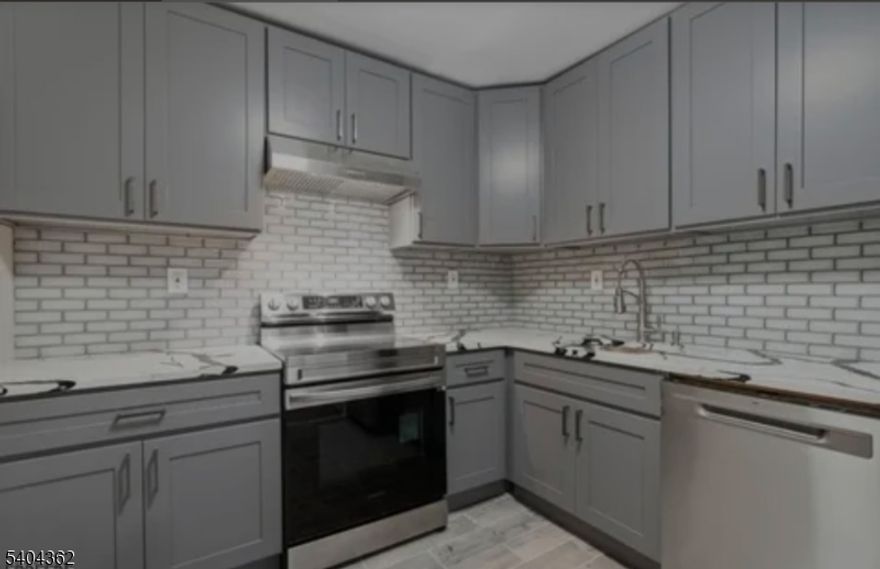 Welcome to this 2 BR 2 BA apt that borders orange and Montclair available April 1, 2026. Modern sunlit 2 Bedroom 2 bath apt located on a peaceful residential block near schools, parks and mass transit- just 5 minutes away from both the Bloomfield and the East Orange  completely renovated train station, perfect for commuters looking for comfort and convenience. Key features include 2 spacious bedrooms+ bonus room ideal for home office or game room. Full bathroom including a private en-suite bathroom, eat in kitchen with stainless steel appliances, private washer and dryer no shared laundry! In a private laundry room + extra storage, Tenant responsible for gas and electric proof of income via last two pay stubs apt available April 1, 2026. Tenant. will have access to private storage room and a fenced in back yard for your enjoyment. No pets