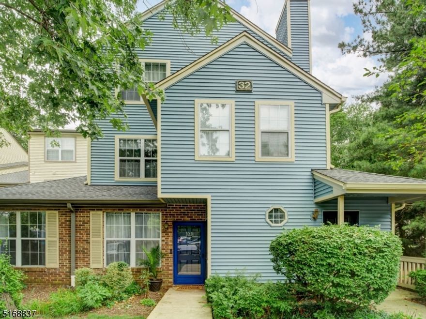 Don't miss out on this beautiful, move in ready 2 bedroom, 2 full bathroom condo in desirable Whispering Woods. Conveniently located on the ground floor with private entrance and storage unit. Nicely updated and beautifully maintained open concept. Butcher block counter with black composite sink all beautifully lit with custom recessed lighting. Impressive oversized primary bedroom with vaulted ceilings and walk-in closet. Sliding glass doors leading to private covered patio and quiet wooded backyard to relax on perfect summer nights. Enjoy cozy winter evenings by the wood burning fireplace with beautifully upgraded stone veneer. AC 1 year old with transferable warranty.  Association amenities include two pools, hot tub, sauna, exercise facilities, tennis courts, club house with full kitchen area, playground, and biking/jogging paths. Great location near major roadways and shopping, and award winning schools.