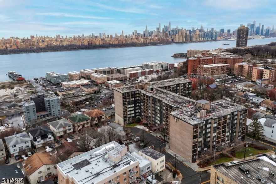 Bright and spacious one-bedroom, one-bath condo with beautiful views of the NYC skyline from every room. This inviting home is filled with natural light and features a private terrace with a retractable screen, perfect for relaxing and enjoying the scenery. Located in the desirable Hudson Park Condominium residents benefit from full-service amenities including a 24-hour doorman, fitness center, and outdoor swimming pool. The property is conveniently situated near NYC bus transportation, shopping, parks, and houses of worship, offering both comfort and accessibility. The HOA includes all utilities electricity, heat, air conditioning, internet, and cable adding exceptional value and convenience. This is a fantastic opportunity to own a bright, comfortable home with stunning skyline views in a sought-after building.