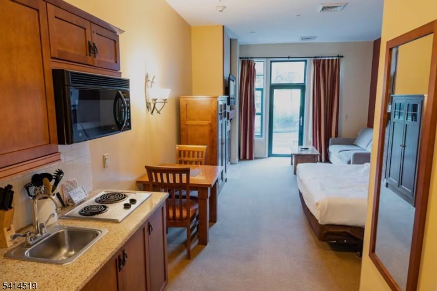 Just step right out of your patio door and walk to everything.  Great location with outside access to the pool, snowboarding, ski trails and ski lodge.  This studio has a full kitchen and walkout to a patio. Fully furnished condominium with gas fireplace and amazing views of the ski slope. Under ground heated parking, elevator, outdoor heated pool, and fitness room.   Plus, you're just a short drive from Crystal Springs Resort, offering golf, spas, and fine dining. Don't miss this opportunity to own at The Appalachian Hotel! This unit is currently in the rental program with the hotel.HOA Fee Includes: Electric, Common Area Maintenance, Exterior Maintenance, Snow Removal, Trash Collection, Water Fees, TV & Internet. Sewer is a separate fee.