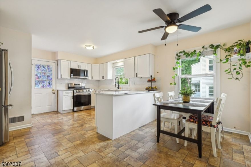 EASY ACCESS TO NYC TRAIN! Renovated HUGE Duplex! Step inside to discover a FULLY RENOVATED large eat-in kitchen, with NEW Quartz counters, shaker cabinets, SS Appliances and subway backsplash. You will LOVE the spacious living room, ideal for relaxation and entertaining. On the second floor, you will find two oversized bedrooms with large closets.  The backyard patio is perfect for outdoor gatherings with grill and natural gas hookup, while the 1-car garage and EV charging station provides added convenience. Basement includes expansive storage space, private in-unit laundry, and additional play area.  AMAZING location close to downtown Westfield, Garwood, and easy proximity to schools and parks. Great opportunity to be in TOP RATED Westfield school district. Don't miss out on this HUGE rental!!