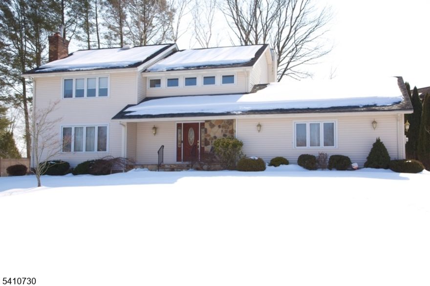 Experience upscale living in this exceptional Colonial, set on a quiet cul-de-sac,in one of East Hanover's most desirable neighborhoods. Thoughtfully updated throughout with timeless elegance and modern sophistication. This home offers a stunning kitchen with quartz countertops, stainless steel top-of-the-line Thermador appliances -seamlessly flowing into the living and dining areas -perfect for upscale entertaining. Adding to the elegance of this home is the inviting family room with gas fireplace and sun-drenched all season room overlooking the beautifully landscaped, fenced in yard. The expansive Trex deck creates an ideal outdoor retreat. The second level displays the luxurious primary suite featuring a spa inspired bath and walk in closet- three additional bedrooms- one with a private balcony, and a sleek updated bath complete the 2nd level. The beautifully finished lower level elevates the home's versatility, offering a sophisticated recreation space, private office, and full bath-ideal for guests, work-from home, extra living or leisure space.. A rare opportunity to own a move-in-ready fully updated home that embodies comfort, design, and distinction. East Hanover offers easy access to major highways, NYC trans, shopping, restaurants, parks, top-rated schools, and low taxes. This beautiful home awaits its proud new owners. Video in media section