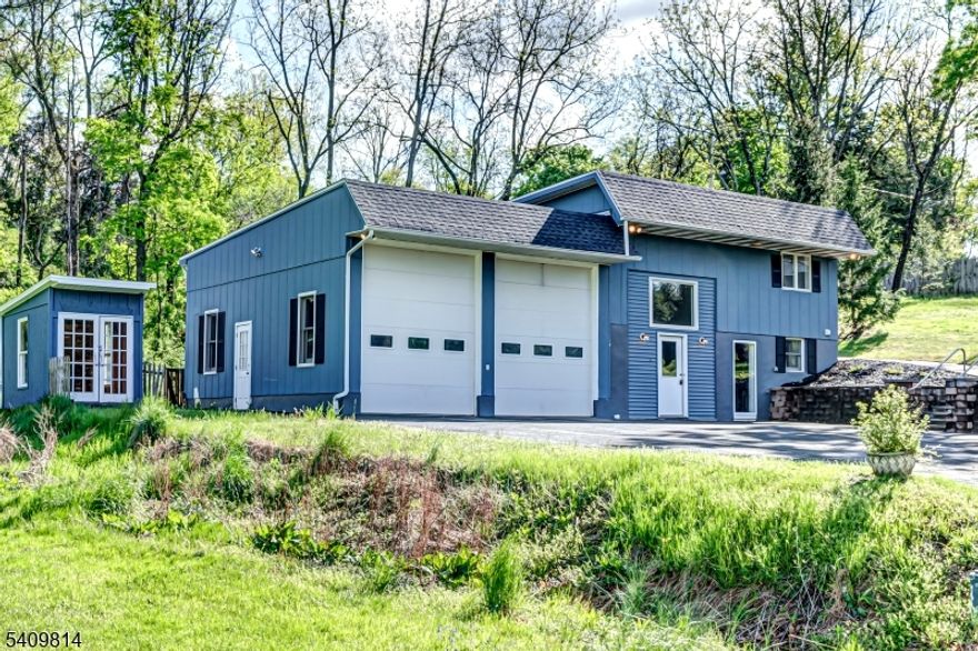 Welcome home to an exquisite haven nestled amidst the tranquil nature-filled landscape of Frenchtown, NJ a truly unique, fully revamped two-bedroom, two-bathroom residence that seamlessly merges contemporary living with an idyllic natural setting, offering more than just an average two-bedroom home. Step into this elegantly renovated home, showcasing a modern kitchen with ample cabinetry, subway-tiled backsplash, and high-end luxury vinyl plank flooring throughout the main level. The open-plan layout is further accentuated by a majestic two-story high formal living room, enhanced by modern recessed lighting, cultivating a warm and welcoming ambiance. The versatile office space can easily be converted into an additional bedroom, providing extra flexibility for your lifestyle needs. Entertain guests in style with your charming side and rear patios, while savoring nature's private backdrop and calming melodies. The property also features two generously-sized garage bays for all car enthusiasts or use an additional space! Conveniently situated just a short drive from Flemington Circle and near the Pennsylvania border, this HomePath treasure strikes the perfect equilibrium between pastoral allure and effortless access to local amenities.