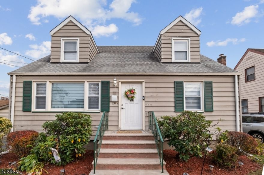 Beautifully maintained one-family home located in a quiet neighborhood, conveniently close to major highways, public transportation, shopping, schools and restaurants. The first floor features two bedrooms, a fully renovated bathroom, a spacious living room, and an eat-in-kitchen. The second floor offers two additional bedrooms and a half bath. The finished basement includes a laundry area and a versatile bonus room perfect for an office, gym or playroom. Additional highlights include hardwood floors, central air conditioning, parking for up to three cars, and a large backyard ideal for outdoor entertaining.