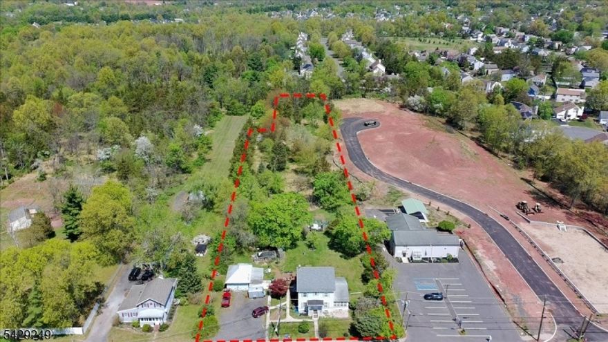 Rare opportunity to own a 2.5-acre property in desirable Hillsborough Township featuring a mother-and-daughter home and a detached two-car garage, with future development potential. The existing home is situated on a generous parcel that may allow the home to remain on approximately 1 acre, with the opportunity to build a new home on the remaining 1.5 acres, subject to all township approvals.The rear parcel may offer future access from Zenk Court, one of the last public roads in the area, adding potential value and flexibility for residential development. All subdivision, zoning, variances, and access approvals are the sole responsibility of the buyer and must be verified independently with the Township of Hillsborough.Ideal for an end user seeking space and privacy, or for investors and builders exploring future possibilities. Conveniently located near major roadways, shopping, and schools.Property being sold as-is..