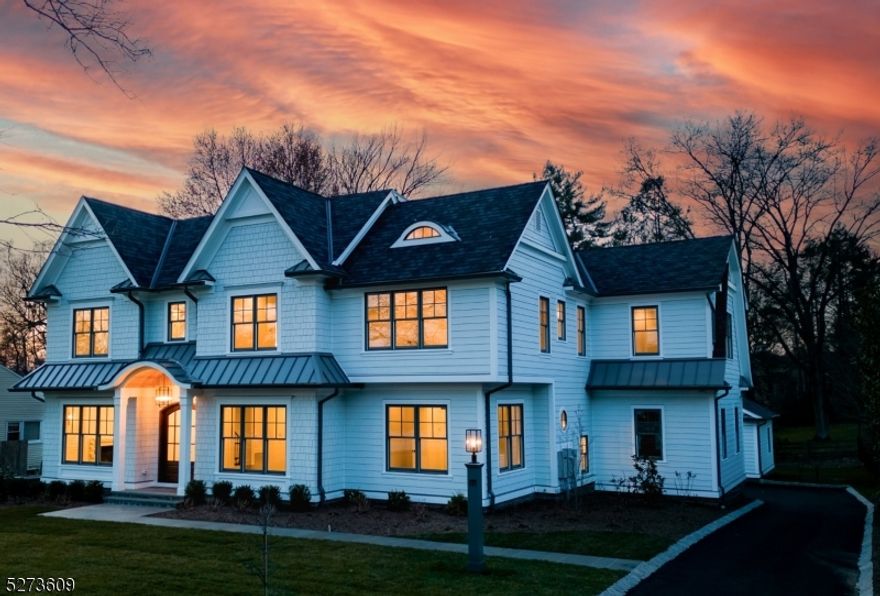 Welcome to this move in ready luxurious new construction in the heart of Rolling Hills. Over 7100 sq ft across 4 finished levels of this intentionally designed home with the finest finishes and amentities to spoil the most discerning homeowner. Special features include large welcoming foyer with herringbone design floors, select grade white oak floors throughout, 10' and 12' ceilings throughout, heated floors with radiant heat in every room throughout the entire house and bathrooms, sundrenched rooms with tall windows and doors, 4 fireplaces with marble surrounds, Chef's kitchen w/ Wolf 48" dual fuel range, Brizo faucet and pot filler, Dacor built-in wine dispenser, Miele 36" refrigerator column, 36" freezer column, two refrigerator drawers, 42" sink work station, large center island with stunning countertops and backsplash, wet bar with 40 bottle wine fridge, luxury Brizo fixtures throughout, designer llight fixtures throughtout, Primary bedroom with vaulted ceiling, marble fireplace, steam shower, soaking tub, custom white oak vanities, 2 walk in closets, laundry room with 2 washer and 2 dryer hookups, 7 ensuite bedrooms, 10' ceiling in lower lever ideal for golf simulator. Finshed lower lever includes wet bar, au pair suite, full bath, rooms for gym and theatre. Heated garages can accomodate lifts. Sitting on almost a half acre of private, level land with a blue stone patio and masonary fireplace outdoors with privacy landscaping. Third garage ideal for future pool cabana.