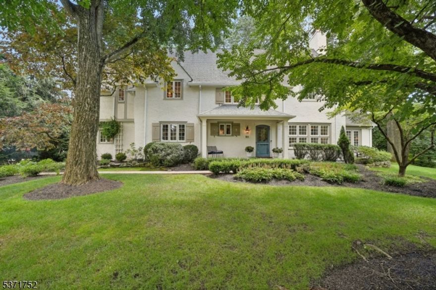 This charming Northside Colonial, circa 1924, thoughtfully expanded & renovated by the current owner blends timeless character for today's comfortable lifestyle without sacrificing its classic grandeur.The residence exudes its own distinct personality through harmonious scale & proportions showcased in the flowing floor plan, embellished millwork, multiple fireplaces, front & rear staircases, & generously sized, sunlit rooms. At the heart of the home is the chef's kitchen & breakfast room distinguished by crisp white cabinetry, expansive granite workstations, a butler's pantry with beverage center & center island with breakfast bar. Stylishly designed first floor with reception hall introduces a dramatic living room with fireplace, gracefully flanked by a sun room on one side & formal dining room on the other. A fabulous family room seamlessly embraces the kitchen & mud room, creating an inviting space for everyday living & entertaining. The second landing leads to the primary bedroom retreat , complete with a luxurious bath and dressing room. Two additional bedrooms share a bath, while the fourth bedroom enjoys the privacy of its own en-suite. The third level offers a versatile layout with a playroom, a potential fifth bedroom, & a private office- ideal for work & relaxation. The impressive outdoor setting, situated on .39 acres of level property,  offers a beautiful bluestone patio perfect for entertaining and relaxation.