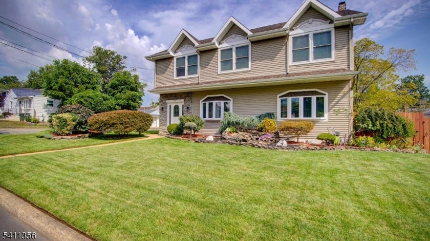 Welcome. 4000 sq ft move-in-ready residence truly has it all. Every detail has been thoughtfully updated, so all you need to do is unpack and enjoy. Offering 6-7 bedrooms and 4.5 baths, this spacious home features gorgeous floors throughout, two en-suite bedrooms, and beautifully finished bathrooms with granite and quartz countertops. Comfort and efficiency abound with a 4-zone heating system, 2-zone central air, tankless water heater, and 8-zone underground sprinkler system. You can unwind in one of two family rooms, cozy up next to the fireplace, or enjoy the flexibility of the fully finished basement, perfect for entertaining or additional living space. Step outside to a true private oasis featuring a heated pool, 7-person jacuzzi, pond with a stunning waterfall, and professionally landscaped grounds with lighting surrounding the entire property. A charming breezeway creates seamless indoor-outdoor flow, and a generator hookup offers added peace of mind. The serene primary suite is a perfect retreat, complete with a two-person jacuzzi tub with jets and a beautiful walk-out balcony..The upgraded kitchen shines with corian countertops, stainless steel appliances, and generous workspace.  property is being sold As Is'