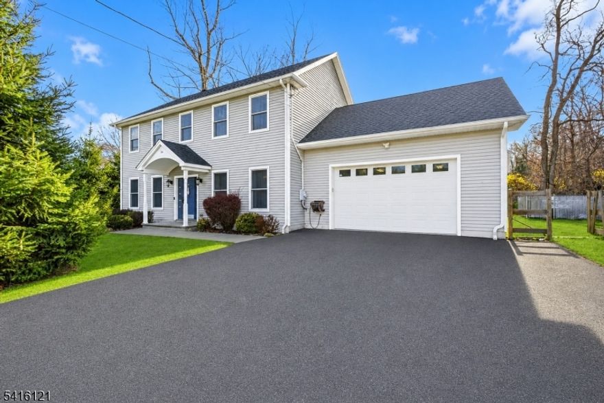 Welcome to Lake Hopatcong living at its finest, where lifestyle, convenience, and value converge in one of Sussex County's most sought-after settings. This 11 Year Old, Newer, Colonial offers a bright, open layout with high ceilings and a striking stone wood-burning fireplace that anchors the main living space with warmth and character. The kitchen flows seamlessly to a rear deck overlooking a newly fenced backyard oasis featuring an above-ground pool and expanded landscaping, perfectly designed for entertaining, relaxing, and enjoying the seasons. The primary suite offers a private retreat with a walk-in closet, en-suite bath with double sinks, and a versatile bonus room ideal for a bedroom, home office, gym, or sitting area. Additional highlights include newer appliances, ceiling fans, abundant storage, and a climate-controlled garage. Major upgrades such as exterior French drain improvements, public sewer, and upcoming natural gas service provide long-term value and peace of mind. Located just moments from the energy of Lake Hopatcong, yet offering space and privacy, opportunities like this don't come around often. This is one you need to experience in person, schedule your private tour today before it's gone. *Property sits on Double Lot, Includes Lot 27 and 29 as per deed. USDA Eligible for $0 Down Payment Loan Program