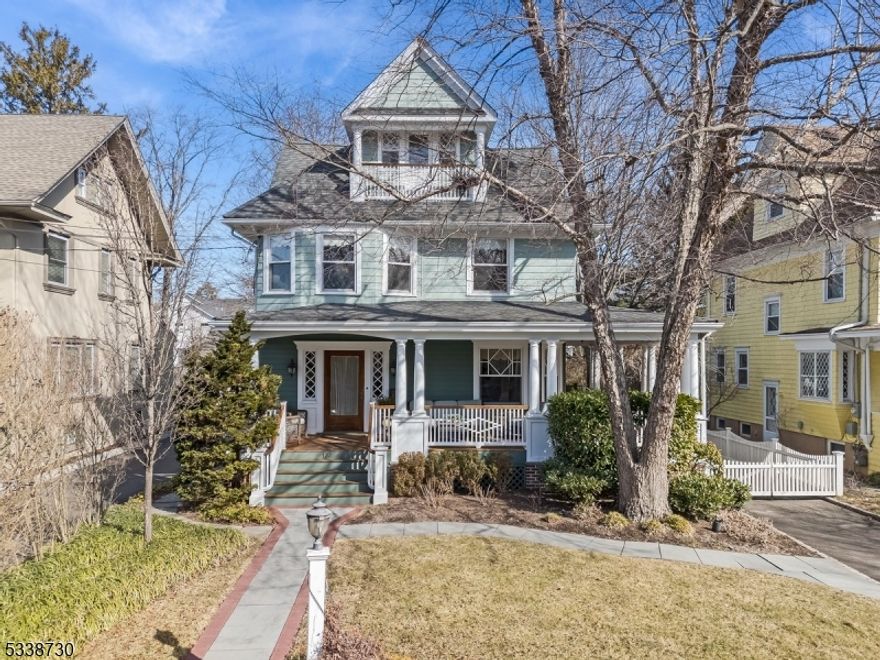 This stunning Victorian Home, with large wrap around porch is nestled in a picturesque neighborhood, boasting 5bds,3 full baths and 2 half baths. Entering the home, you are welcomed by a grand foyer that sets the tone for the rest of the house. High ceilings, ornate moldings, and beautiful stained glass windows create an inviting atmosphere. Off the foyer is the spacious dining room, perfect for entertaining. As you move through the house, you enter the living room, full of natural light from all of the windows and also features a grand fireplace.The eat-in kitchen features a built in banquet, plenty of cabinet space and updated appliances.Conveniently off the kitchen is a mudroom with an attached powder room. The 2nd fl features 4 bedrooms.The spacious primary bedroom is en-suite with a updated, beautiful full bathroom. Another 3 bedrooms and a full hallway bathroom completes this floor. As you step up to the third floor, you will discover a large, open bedroom that offers endless possibilitie with an adjoining full bathroom.The charm of this Victorian home extends to its finished basement,Stepping outside, the backyard is a true oasis, designed for both relaxation and entertainment. A large stone patio provides ample space for outdoor furniture and dining, making it the perfect setting for summer barbecues or evening gatherings.The centerpiece of the patio is a stunning stone fireplace and the built-in grill complements the outdoor living space.