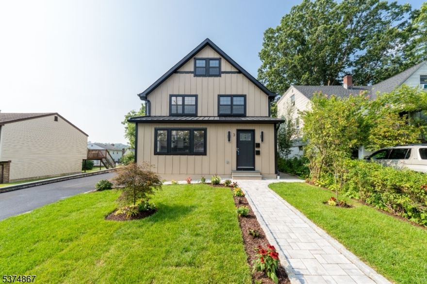 Welcome to this beautiful, fully renovated, turn-key property with 2 units. Whether you're an investor, owner-occupant, or looking for a multi-generational living setup, this property provides flexibility, comfort, and long-term value. Each unit is thoughtfully designed with a private entrance and is fully renovated with high-end craftsmanship. The stunning new kitchens feature quartz counter tops, tile back splash as well as floors and new appliances. Each unit has an open concept living/dining area. Each unit includes a master bedroom suite with walk-in-closets. Plenty of storage throughout. The finished basement includes separate laundry rooms for each unit with brand new washer/dryers. Each unit has separate utilities including tankless water heaters, electric meters and new forced air gas heating/cooling with a 20 year guarantee. The new roof includes a 30 year guarantee. Meticulously landscaped yard with patio in the back yard. Over-sized garage with electric door opener and private newly paved driveway. Prime location near top-rated schools, shopping, public transit, and major highways. Commutable to NYC.  Don't miss this rare opportunity to own a truly exceptional investment property in a thriving community!