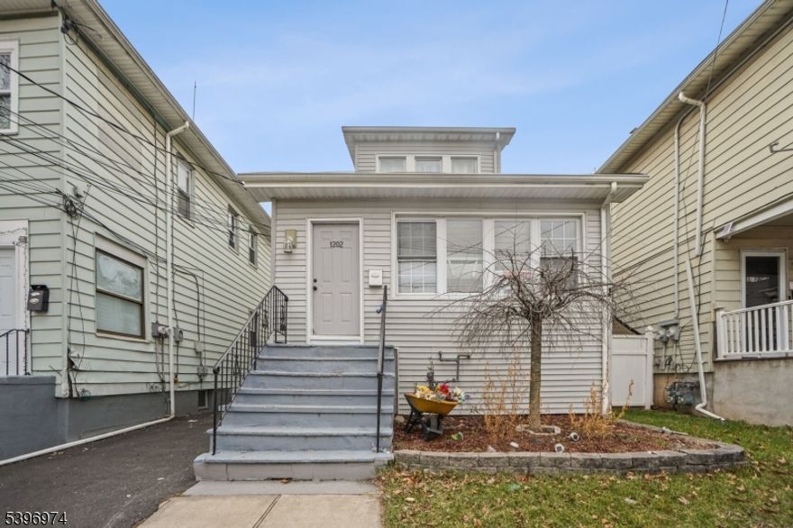 Beautifully updated two family home in Roselle offering an exceptional opportunity for both investors and owner occupants. The first floor unit is a spacious 2 bedroom, 2.5 bath layout that seamlessly connects to a finished basement, perfect for additional living space, a recreation area. The second floor unit is a bright and modern 1 bedroom, 1 bath apartment, also fully updated and featuring forced hot air and air conditioning for year round comfort. Both units have been tastefully updated with contemporary finishes and thoughtful design throughout. The property offers private parking, a driveway, and a backyard, providing outdoor space for entertaining or relaxation. Whether you're looking to live in one unit and rent the other or add a turn key property to your portfolio, this home delivers comfort, convenience, and strong rental potential in a desirable Roselle location.