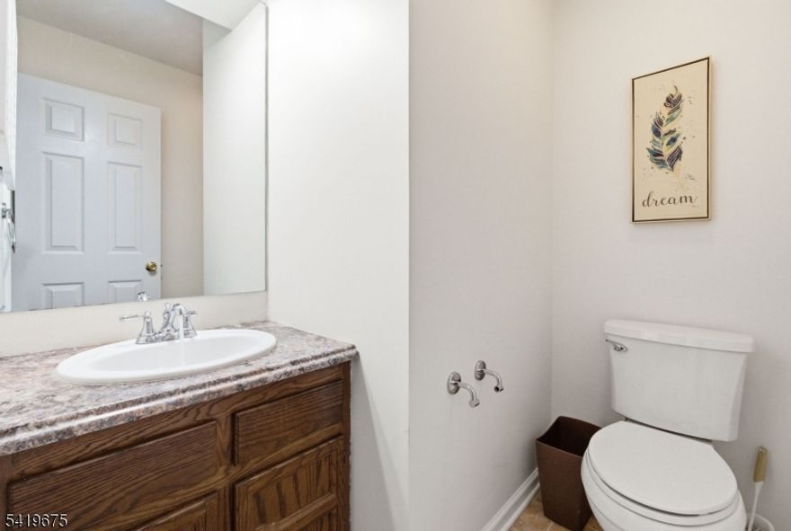 Welcome to this 3-bedroom, 2.5-bath townhome located in the highly desirable gated community of Panther Valley.  Offering comfort, convenience and lifestyle, this home features a 1 car garage, a large mud/utility/laundry room with direct access outside, and a cozy deck off the dining area - perfect for morning coffee while enjoying mountain views. The main living areas offer a functional layout ideal for everyday living and entertaining.  A finished room in the basement provides for a quiet office space, an additional living area or anything else you might imagine. Move right in with fresh paint and professional cleaning already complete. Residents of Panther Valley enjoy access to outstanding community amenities including pools, tennis and pickleball courts, basketball courts, playgrounds, and walking paths. Conveniently located near Interstate 80, this home offers easy access for commuting, shopping and everyday needs. Quick closing possible.  Property being sold As-Is. Buyer responsible for smoke/CO.Membership to Panther Valley Golf & Country Club is separate and optional.