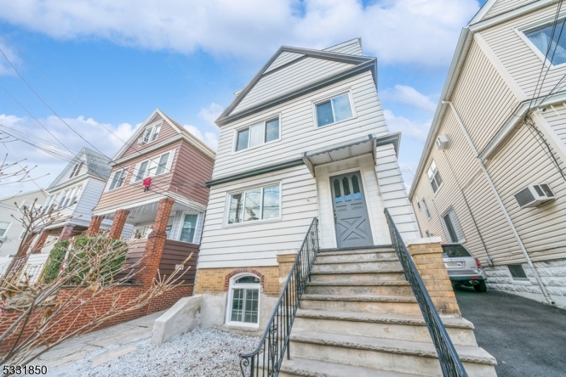 Welcome to this charming and well-maintained three-family home located in the heart of Bayonne, NJ. This multi-family property offers three spacious floors, each with excellent, long-term tenants, making it a great investment opportunity. The property features a private parking area and a garage, providing ample convenience for residents.The basement holds incredible potential for additional living space or storage, allowing you to enhance the property's value. Situated in a desirable neighborhood, this home offers a blend of functionality and potential.This property is being sold as-is, making it an ideal choice for savvy investors or those looking to put their personal touch on a multi-unit home. Don't miss out on this opportunity to own a solid income-generating property in Bayonne!