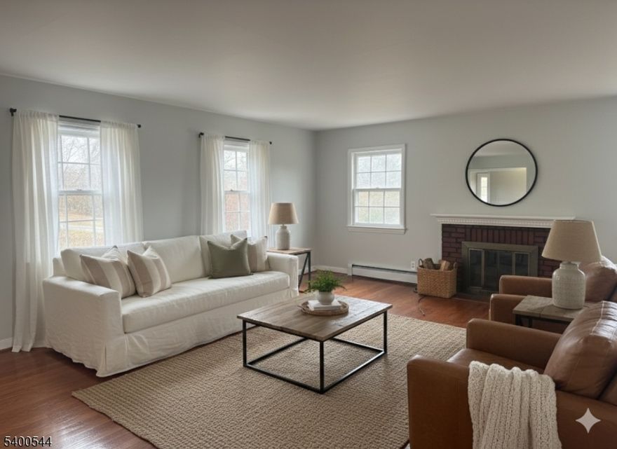 Newly renovated and full of charm, this inviting colonial offers modern comfort in a fantastic location close to shopping with easy highway access for commuting. Situated on a beautifully flat lot of over an acre, the home features abundant natural light, a large eat-in kitchen, a welcoming mudroom, and an expansive front porch perfect for relaxing. Recent upgrades include a new high-efficiency gas furnace, a newer roof, and a four-bed septic system, ensuring peace of mind for years to come. With three versatile outbuildings adding extra storage or workspace options, this property is truly a gem don't miss it! Property is winterized.