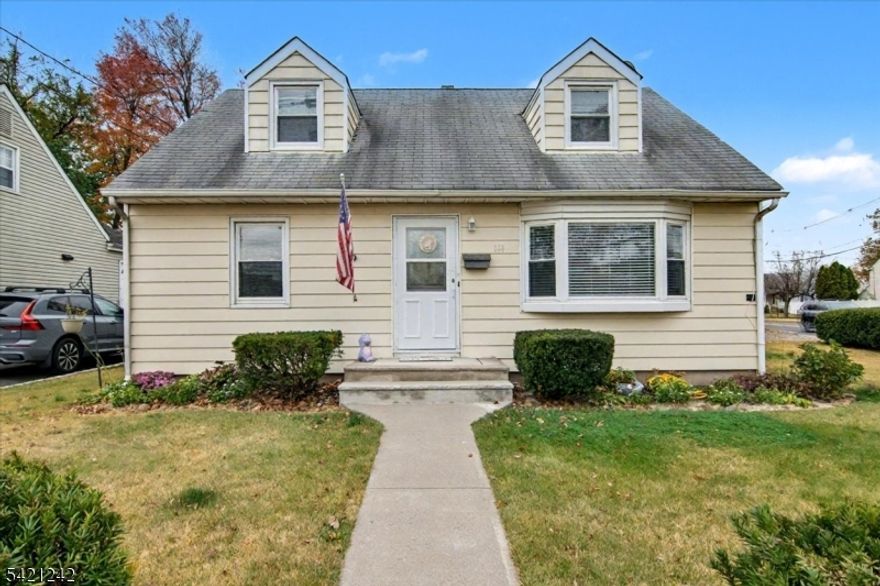 Charming four-bedroom Cape Cod located in the heart of Kenilworth! This beautifully maintained home features an updated kitchen and bath, hardwood floors, and central air for year-round comfort. The spacious layout offers a warm and inviting living area, perfect for relaxing or entertaining. A full basement provides ample storage and additional living space. Situated on a lovely fenced property in a desirable neighborhood close to parks, schools, and transportation this home combines classic charm with modern updates.