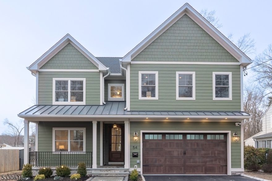 Designer styled & impeccably curated, this spectacular newly constructed 4700 sq ft Colonial is the epitome of modern living. No detail has been missed in this quality-built home, completed by the reputable Lefko Brothers, Family Builders. From the moment you enter, you will be captivated by the open & sundrenched floorplan complemented by the outstanding architectural features throughout, including 9' ceilings, custom millwork & much more!  Beveled glass wood front door leads you to the double entry foyer welcoming you to the Living Rm w/ large front windows. Gracious Dining Rm flows to the stunning Kitchen accenting wood cabinets w/ underlighting, Callacata Rolex stone counters, GE Cafe white appliances & huge center island. The adjoining Family Rm highlights include a gas fireplace, flanked by custom bookcases, entertainment area w/ wine refrigerator & lit cabinets. Convenient access to stone patio & fully fenced, level rear yard. First Fl. Guest Suite w/ full Bath, Powder Rm, Mud Rm & access to 2-car garage complete this level. Upstairs features Primary Suite w/ double WICs & luxurious spa-like Bath, creating the perfect retreat. 3 additional Bedrooms w/ large closets, equipped w/ organizers, full Bath & Laundry Rm. Fully finished Lower level is brimming w/ space & versatility. Recreation Rm w/ wet bar & Electric FP, 6th BR w/ adj. full Bath, Office, & extra Laundry Rm. Award winning schools, convenient commute to NYC by both bus & jitney to nearby Midtown Direct trains.