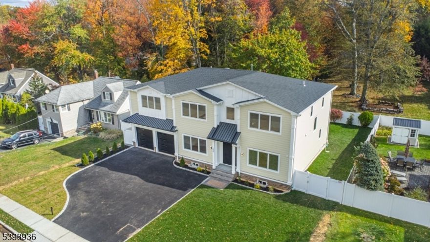 Welcome to a new era of luxury living. This stunning 6 BR / 5.5 BTH new construction residence in the heart of Paramus offers suburban luxury at its finest. Upon entering, you'll be greeted to a dramatic 2-story entry foyer & sunlit open-concept Living Room that flows into a banquet-sized Dining Room w/ gleaming hardwood floors. The show-stopping Gourmet Kitchen features a grand center island, custom cabinetry, designer fixtures, & top-of-the-line appliances. The adjacent Great Room with soaring ceilings & a statement fireplace creates an inviting atmosphere for gatherings. The 1st floor also includes a Junior Suite with Full Bath, Butler's Pantry, well-appointed Mudroom, & direct access to the oversized 2-Car Garage. Upstairs, the Primary Suite is sure to impress the most discerning buyer with its dual walk-in closets, fplc & a spa inspired bath with oversized shower & soaking tub. A second Junior Suite, 2 additional Bedrooms, a Full Hall Bath, Loft/Office space, and a convenient Laundry Room complete the upper level. The fully Finished Basement is hosts to the ultimate in entertainment featuring a sleek Wet Bar, state-of-the-art Theater, Home Gym, 6th Bedroom, Full Bath, & ample storage. The park-like yard is fully fenced-in providing both blissful tranquility & a great space to entertain. Appreciate all that living in Paramus affords you: close proximity to top-rated schools, golf courses, premier shopping, lush parks including Van Saun Park/Zoo & an EZ commute to NYC.