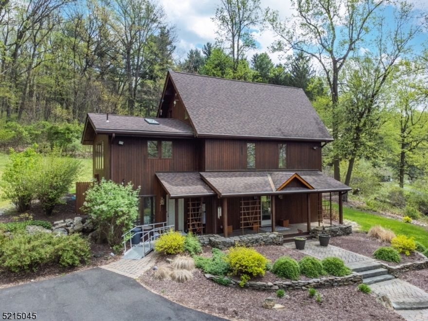 Gorgeous Lindal Cedar Home with walls of windows giving natural light and privacy on 20+ acres! 8+ acres in White Twp. and 12+ acres in Liberty Twp.  Ground level includes massive mud room/laundry room, family room with beamed ceiling, two spacious bedrooms and full bath.  2nd floor offers open floor plan with floating staircase between living and dining rooms, high ceilings, updated center island eat-in kitchen and primary suite with walk-in closet, full bath with stall shower, skylight and bedroom has sliders to deck.  Loft on 3rd floor.  Hardwood flooring on 2nd and 3rd floors, new carpeting on ground floor and primary suite, new roof in 2019 and driveway repaved in 2020. Incredible character, like living in a tree house!  Woodland managed by local forester and logger.  Property in both White Twp and Liberty Twp; 3 lots:  12.43+7.16+1.0 = 20.59.