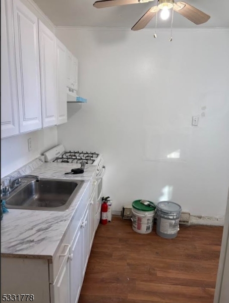 Cozy one bedroom apartment in the heart of Garfield.  Freshly painted, new flooring, new vanity and more.  The train station on the corner gets you to Hoboken in 30 minutes and then NYC is 5 minutes away. Close to shopping, public transportation, houses of worship, and much more.