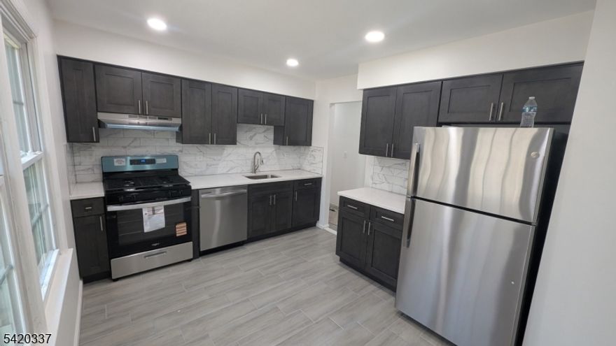 Welcome to this beautifully updated 2-bedroom, 1.5-bath top-floor unit at 63 South Spruce Street in Ramsey. This second-floor home features a fully renovated kitchen and bathrooms, brand-new appliances, and fresh paint throughout, offering a clean and modern living space.Enjoy the convenience of on-site laundry, garage and driveway parking, and easy access to NYC transportation perfect for commuters. The unit will be move-in ready by April 1st, with carpets freshly shampooed prior to occupancy.Rent is $2,950/month. Don't miss this opportunity to live in a bright, updated home in a prime location!