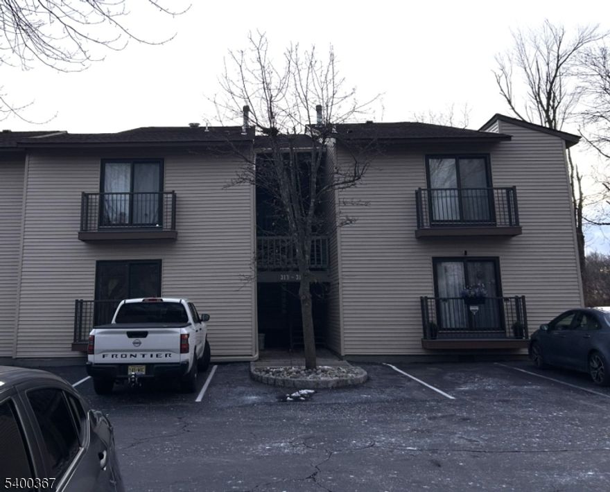 Enter this beautiful 2 bedroom 1.5 bath condo in the Spruce Hills development. Features include open floor plan with vaulted ceilings and a wood burning fireplace, primary bedroom with walk-in closet. Updates include new stove & dishwasher / vinyl siding on the building / front and back decks / new sliding doors / water filtration system / Alexa compatible ceiling fan/lights and blinds. Alarm system with keyless entry. Newer flooring / main bath / HVAC. Amenities include: pool / tennis / basketball and clubhouse. Close to Spruce Run Reservoir and High Bridge train station.