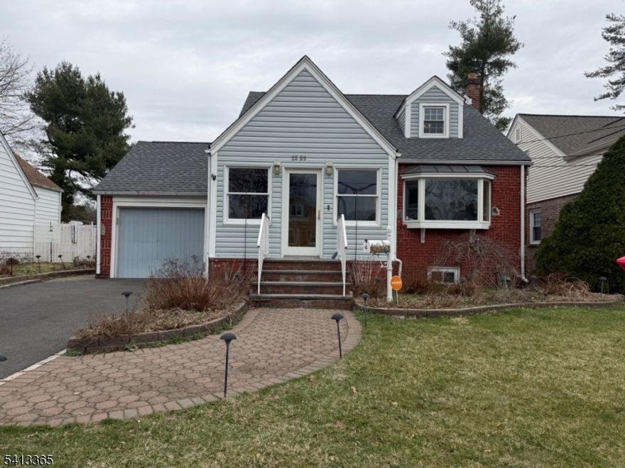 A pretty front enclosed porch with tile floor welcomes you into this 3 BR cape cod with brick front and aluminum sided exterior. First floor: Living room, Formal Dining room with large bay window, eat-in kitchen with sliders to a large 2 tiered rear deck, a primary bedroom and a full bathroom with a jetted bathtub. Second floor: 2 more bedrooms, a half bath, and attic storage areas. The basement is large and has a utility area, laundry area plus an entrance directly leading into the one car built-in garage. Features include a gas/steam heating system, 2 year old roof, fenced in private yard, 3 zone sprinkler system for front & back lawns, backyard shed, storage closets and more. Nearby is Biertuempfel Park and town tennis courts.