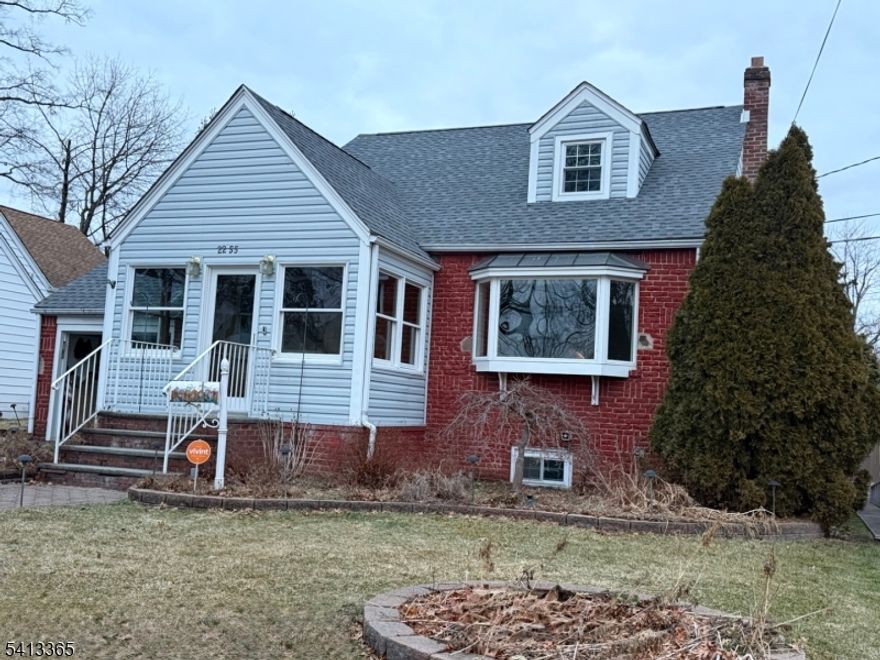 A pretty front enclosed porch with tile floor welcomes you into this 3 BR cape cod with brick front and aluminum sided exterior. First floor: Living room, Formal Dining room with large bay window, eat-in kitchen with sliders to a large rear deck, a primary bedroom and a full bathroom with a jetted bathtub. Second floor: 2 more bedrooms, a half bath, and attic storage areas. The basement is large and has a utility area, laundry area plus an entrance directly leading into the one car built-in garage. Features include a gas/steam heating system, 2 year old roof, fenced in private yard, 3 zone sprinkler system for front & back lawns, backyard shed, storage closets and more.