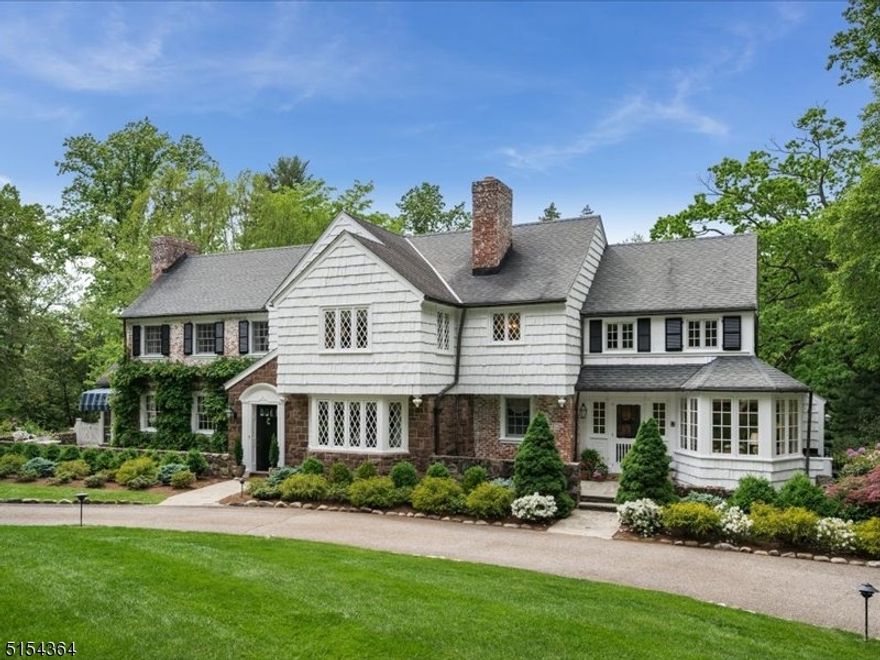 Classic, understated elegance on one of the finest streets in town!  Live and entertain with ease in this impeccably maintained and beautifully appointed Colonial situated on 1.85 acres of exceptional property. Highlights include lovely formal Living and Dining Rooms, cozy Family Room, gourmet eat-in Kitchen, large Butler Pantry, sunny Breakfast Room and charming wrap-around screened-in Porch that overlooks the resplendent grounds and pool. Upstairs, the Master Suite offers the luxuries of space and privacy with an updated Bath, wood burning fireplace, Sitting Room, walk-in closets and Sun Deck. Four additional Bedrooms, Baths and Office complete the second level. On the lower level, you will find a fully equipped Recreation Room that opens to the Patio and in-ground heated Pool. A sweeping lawn, perennial gardens, specimen trees and a charming Greenhouse enhance the tranquil setting. Essex Fells is an idyllic hamlet that enjoys excellent schools, extraordinary natural beauty and small town charm with an easy commute to NYC.