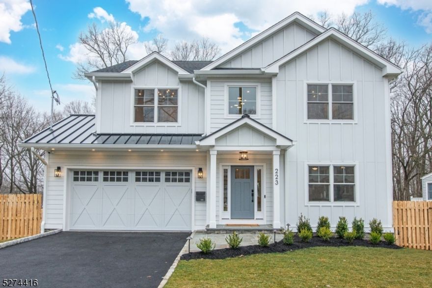 Just 1mi to downtown and featuring a modern design, this 5 BR, 4.5 BA new construction boasts top-of-the-line finishes. Study (or LR) with French doors greet you upon entry. The heart of the home is the Chef's kitchen, boasting white shaker solid wood cabinetry, Thermador pro-line appliances, a spacious center island that effortlessly flows into the FR with a stylish linear gas fireplace flanked by custom benches and an adjoining dining area. Double sliders offer easy access to the deck overlooking private backyard. Off of the kitchen you'll find a convenient mudroom w/custom cabinetry, a show-stopping powder room, and access to the 2car garage with Tesla charger. The upper level features a luxurious Primary Suite, a junior suite, two additional BRs accompanied by a well-appointed hall bath, and a laundry room for added convenience. The Primary Suite features walk-in closet with custom cabinetry, mirror and sliding door as well as an en-suite bathroom that boasts spa-like amenities: back-lit mirrors, towel warmer, heating floors & fantastic wet room: with 3 different shower head options as well as the soaking tub.The walk-out LL of the home has been beautifully finished and offers a versatile rec room with kitchenette and a TV built-in, spacious BR with 2-sided window exposure, a full bath, and sliders to the waterproofed covered patio with steps to the backyard. Fully fenced-in yard offers plenty of room for fun, and wooded lot in the back offers privacy and tranquillity.