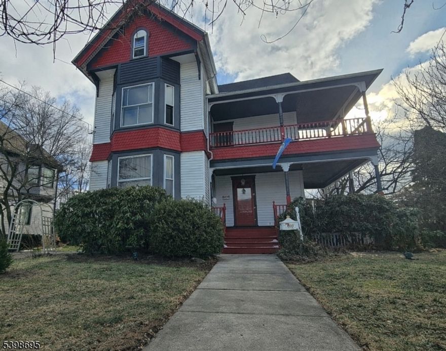 Step back in time with this remarkable Queen Victorian home featuring original architectural details dating back to 1880. This exquisite residence showcases magnificent woodwork, a grand three-story staircase, stained glass windows, hardwood floors, and classic pocket doors. Historic charm blends seamlessly with modern convenience thanks to a beautifully remodeled kitchen complete with granite countertops, cherry cabinetry, and stainless steel appliances.Three levels of spacious living offer comfort and versatility, highlighted by a newly renovated primary bathroom designed with modern amenities and a clean, contemporary feel. Outdoor living is equally impressive with two wrap-around porches, a large patio, and a comfortably sized backyard featuring an inground pool with spa and diving board your own private oasis. For today's lifestyle, the property also includes an EV charger in the rear driveway, ensuring you're ready for the future of transportation.This unique property offers timeless elegance, thoughtful updates, and exceptional space inside and out.