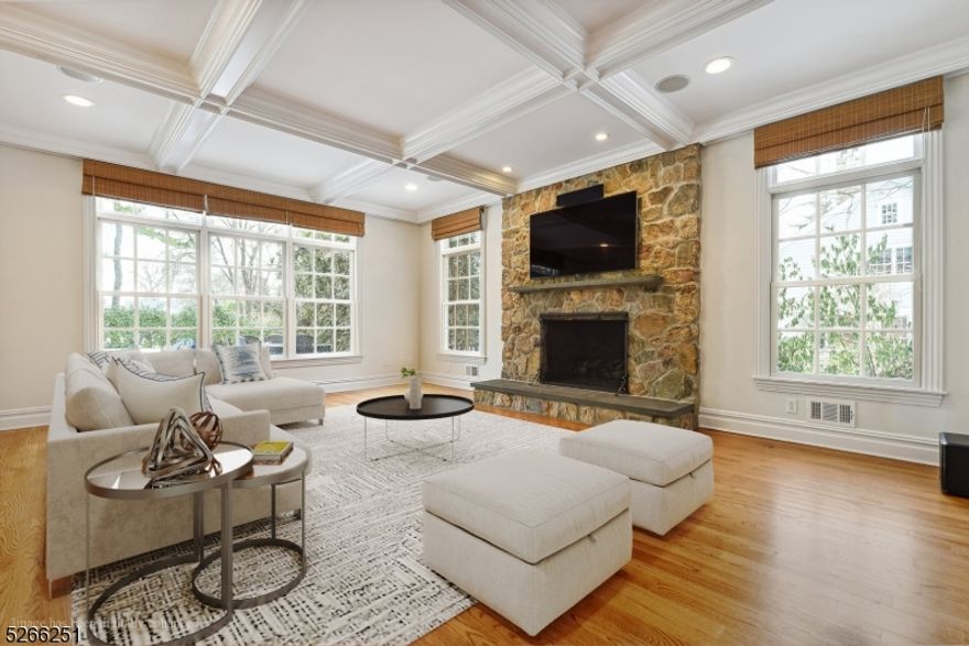 Nestled on a private & coveted street in Rolling Hill - this home will captivate you from the moment you enter.  Much of the interior is freshly painted and many new decorator light fixtures recently added.  The tree canopied neighborhood is coveted for it's fine homes on exceptionally large flat lots. The floor plan is timeless with a huge open kitchen to family room w/ fireplace overlooking the private backyard. The large kitchen island, huge walk in pantry and Butler's serving area between kitchen & dining room - are welcome features. Exquisite curb appeal and a sun-drenched interior with endless oversized windows everywhere. All 5 of the second floor bedrooms have full en-suite baths and walk-in closets. Beautiful hardwood flooring throughout. Full 3rd floor with lounge, generous private bedroom, full bath & walk-in attic access. Fully finished basement with recreation area, bedroom & full bath + several play/flex areas.  Three car garage with storage. Generator.  Huge level yard perfect for all budding sports enthusiasts and large patio with built in grill is ideal for outdoor entertaining.  Located on a street with $4.0+ homes - enjoy suburban living at its finest.