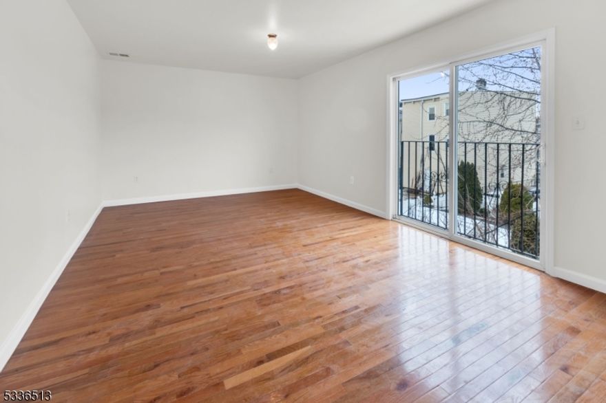 353 New St, located in the University Heights section of Newark, offers a spacious 4-bedroom, 2-bath residence featuring a bright living area, a functional kitchen with ample cabinet storage, and well-sized bedrooms with natural light throughout. Both bathrooms include tile finishes and standard fixtures. Conveniently situated near NJ Transit bus lines, University Hospital, NJIT, Rutgers?Newark, shopping, parks, and major highways, this location provides easy access to Downtown Newark and NYC commuter routes.