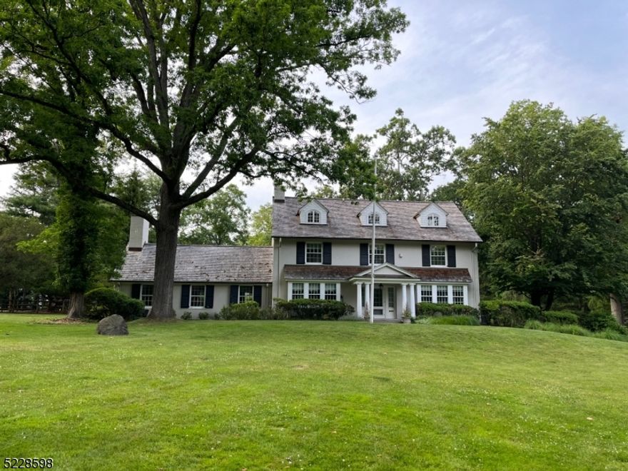Sitting on 1.68 Acres this 5 bed 4 full and 3 half bath house is one of the Classic homes in Essex Fells. Carriage house with full kitchen and living room above the 4 car garage.. amazing property.. gunite heated pool. with powder room.