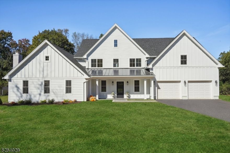 This newly built Just Divine Property is refined modern luxury. 47 Lexington offers luxury living in this New Construction on an existing sturdy foundation. Upon entering, gleaming hardwood floors welcome you through double arches into the magnificent Chef's Kitchen. Your dream kitchen awaits, with large double islands, top of the line stainless appliances, and abundant storage. The family room is a dream with 12 foot vaulted ceilings, a gas fireplace, and double sliding doors leading you to an expansive patio, overlooking your luscious backyard. Enjoy holiday gatherings in front of a wood burning fireplace, with sitting area to relax after a big meal. The basement is perfectly finished for a media room, playroom, or extended living. On the second floor, the master suite is a perfect resting place with crown molding, double walk-in closets, and a serene private bath. Each guest room features its own private en-suite, while a jack-and-jill bathroom joins two additional bedrooms. Car lovers will truly enjoy the 4 car attached garage. This is more than a home; it's an extraordinary living experience tailored to your desires. Look no further, your Dream Home awaits!