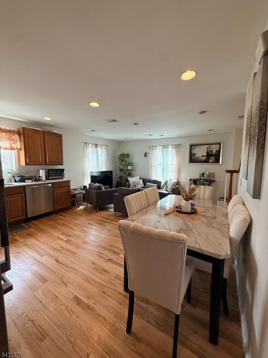 Spacious and comfortable 4-bedroom, 1-bath apartment for lease In Haledon NJ. Hardwood floors run throughout, and the kitchen is updated with stainless steel appliances and stone countertops. Natural light fills the space, giving it a bright, easygoing feel. Laundry hookups add everyday convenience. Well-kept and move-in ready, with close access to shopping, dining, and transportation
