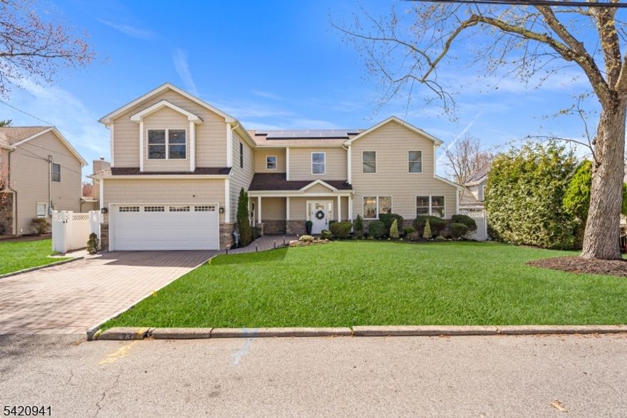 Welcome to this beautifully updated Custom Center Hall Colonial nestled in a desirable residential neighborhood in Emerson, NJ. This spacious home offers 5 generously sized bedrooms & 3.5 bathrooms, thoughtfully designed for both comfort & functionality. A grand two-story entry foyer sets the tone, leading into an open floor plan that seamlessly blends everyday living & entertaining. The inviting living areas are anchored by a cozy gas FP, creating a warm & welcome atmosphere on the main level. Thru-out the home, you'll find gleaming hardwood floors & freshly painted interiors in soft, neutral tones that enhance the abundance of natural light. The EI-Kitchen is a true centerpiece, featuring stainless steel appliances, elegant granite countertops, pantry & ample cabinetry for all your storage needs. The first level includes a convenient guest suite, complete with shower access, ideal for maximum flexibility. Upstairs, the Primary Bedroom Suite offers a private retreat with a separate sitting room, abundant natural light & a spacious ensuite bath. Energy saving(owned) Solar. Enjoy a fully fenced backyard oasis featuring a brand-new gazebo, multiple storage sheds, & plenty of room for outdoor gatherings or relaxation. Highly rated Emerson schools. Exceptionally well maintained & ideally located close to NYC transportation via NJ Transit Pascack Valley Line trains & buses. This home perfectly balances suburban comfort with commuter convenience. This one won't last.