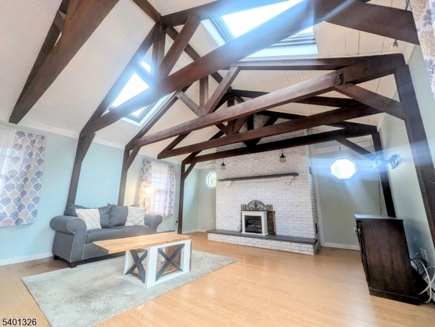 One level ranch living in sought after neighborhood with 3BR, 1.5BA, 1 car garage, public H2O & sewer, natural gas heat, vinyl siding, spectacular 23x17 family room with cathedral ceilings, skylights, dry bar, brick fireplace & sliders to deck. Living room with 2nd fireplace. Plenty of additional parking with double wide blacktop driveway. Fenced level yard with outbuilding storage & fenced garden area. Close to highways, schools, shopping & recreation. Musconetcong river with great fishing nearby.