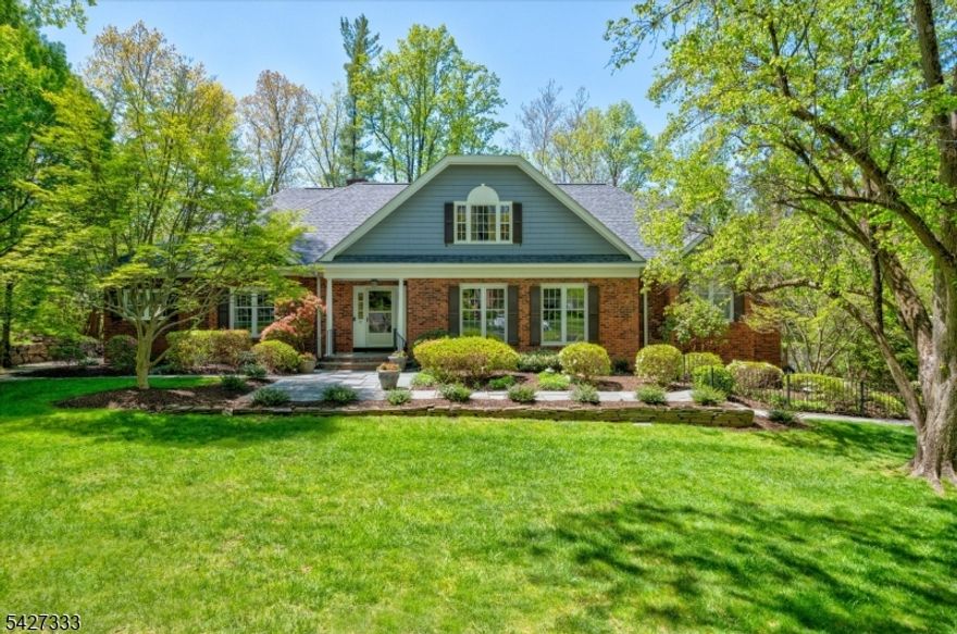 Located in the highly sought-after Deerfield section,this expansive six-bedroom home offers a flexible,thoughtfully designed layout with generously sized rooms ideal for everyday living and entertaining.Main level features a spacious living room, large family room with fireplace, and formal dining room perfectly suited for hosting.A screened-in patio extends the living space, creating a seamless indoor-outdoor connection for dining and relaxing.The updated kitchen is centrally located,providing excellent flow throughout.A 1st floor primary suite with large closets and private bath, an additional bedroom, and convenient laundry room complete this level. Upstairs 4 large bedrooms offer exceptional space and comfort,complemented by 2 full bathrooms, dedicated office, and ample storage?ideal for a variety of lifestyle needs. The lower level adds living space, featuring media room, recreation area currently used as a gym, and brand new full walk-out bathroom with easy access to pool?perfect for guests, entertaining, or extended stays. Outdoors the property truly shines with a stunning pool set in a beautifully designed backyard. A spacious patio with a built-in grill, multiple seating areas, and room for dining creates an inviting setting for entertaining, while the surrounding lawn offers addtl space for recreation and play. Combining expansive interiors with resort-style outdoor living, this home presents a rare opportunity in one of Short Hills? most desirable neighborhoods.
