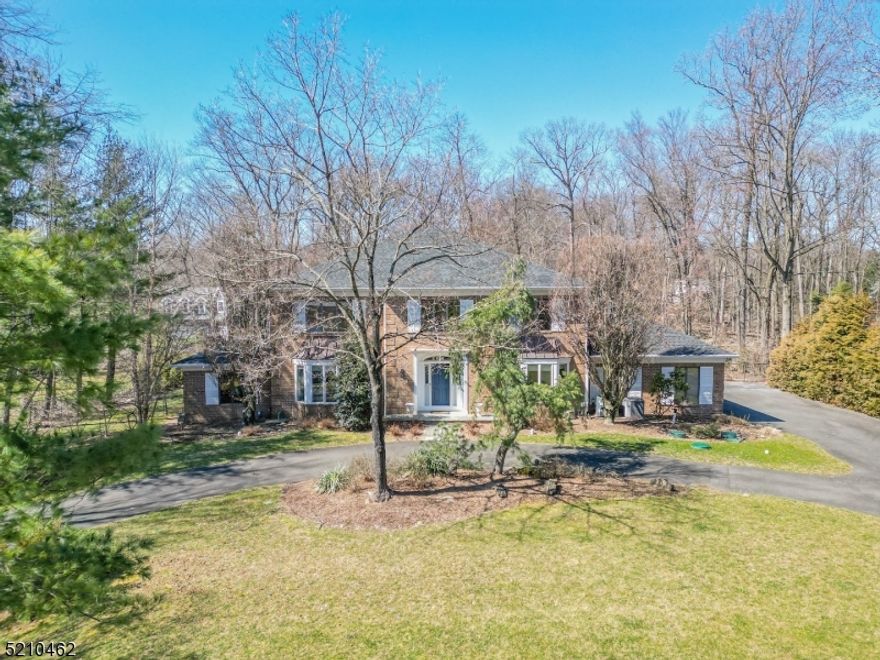 Beautifully appointed custom brick Colonial nestled on a quiet Cul de Sac in a premier location of USR.Elegance & sophistication,this sun filled home offers a classic floor plan conducive to grand scale entertaining.Enter the home through the dramatic 2 ST Foyer & glance to either the FLR w/custom MITERBOX built-ins or banquet size FDR. Stunning GRT Rm w/stone FPL surrounded by windows overlooking the most private rear grounds .Updated chefs kitchen w/center island,high-end appliances & sun drenched octagonal breakfast room.Private 1st. floor owners suite w/vaulted ceiling,custom closets &  LUX designer BTH w/MITERBOX cabinetry.Home office,LNDRY & mud rm complete this floor. Upstairs finds an incredible multi functional bonus rm. w/fBTH,BR & additional LNDRY Rm.BR-En suite + 2 additional BRS & updated FBTH.LL offers FMLY RM plus huge storage area & workshop w/access to the 3 car garage.With Just a glimpse of the rear yard, expansive deck& alluring Gunite pool your search will end.Hurry this one will not last!