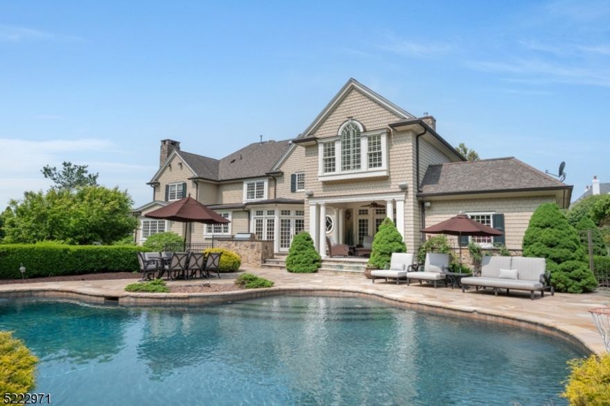 Beautiful, Bel Air classic colonial redone by renowned architect John James in 2006. 6bds, 4.2bths almost 7000 ft.  of pure luxury. Grand 2 story foyer, herringbone,hd/wd flrs, custom moldings, wood trim & coffered ceilings. European style center island, ktchn, granite countertops, travertine flrs, wolf range, top-of-the-line applncs. Butler's pantry leads into extra large dining rm. Oversize family room w/ built-ins book cases surround luxurious fireplace. Wet bar off the living room for prvte entertaining. Home office with fire place. custom built ins & French doors lead out to cozy covered porch. Magnificent bilevel backyard oasis. Walk out from kitchen to Freeform salt water pool and spa, private landscaping. Sports/basketball/pickle ball court walkout lower level, arts and crafts room, xtra bedroom and full bth. Large game room, room for future home theater. Master suite w/ vaulted ceilings, private sitting area and fireplace. 2 large, walk-in closets. 4bds upstairs, walk up attic. Too many upgrades to list.