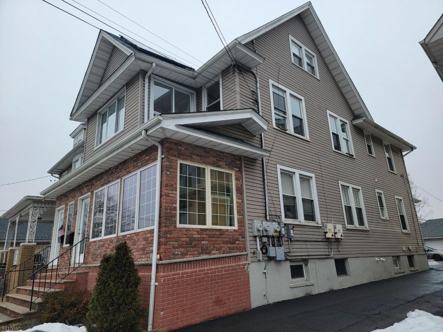 Beautiful two-family house, completely renovated in excellent condition. Features finished basement and attic, ample parking space and two-car garage and much more. In the desirable Westminster Section close to all public transportation.